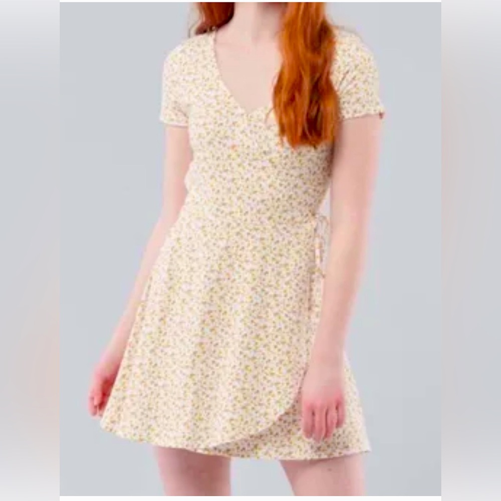 White and yellow floral wrap dress from Hollister size extra small.
